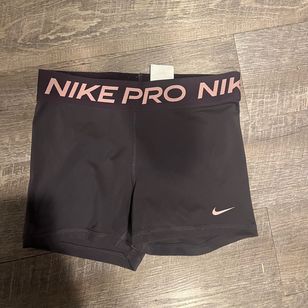 purple and pink nike pro spandex